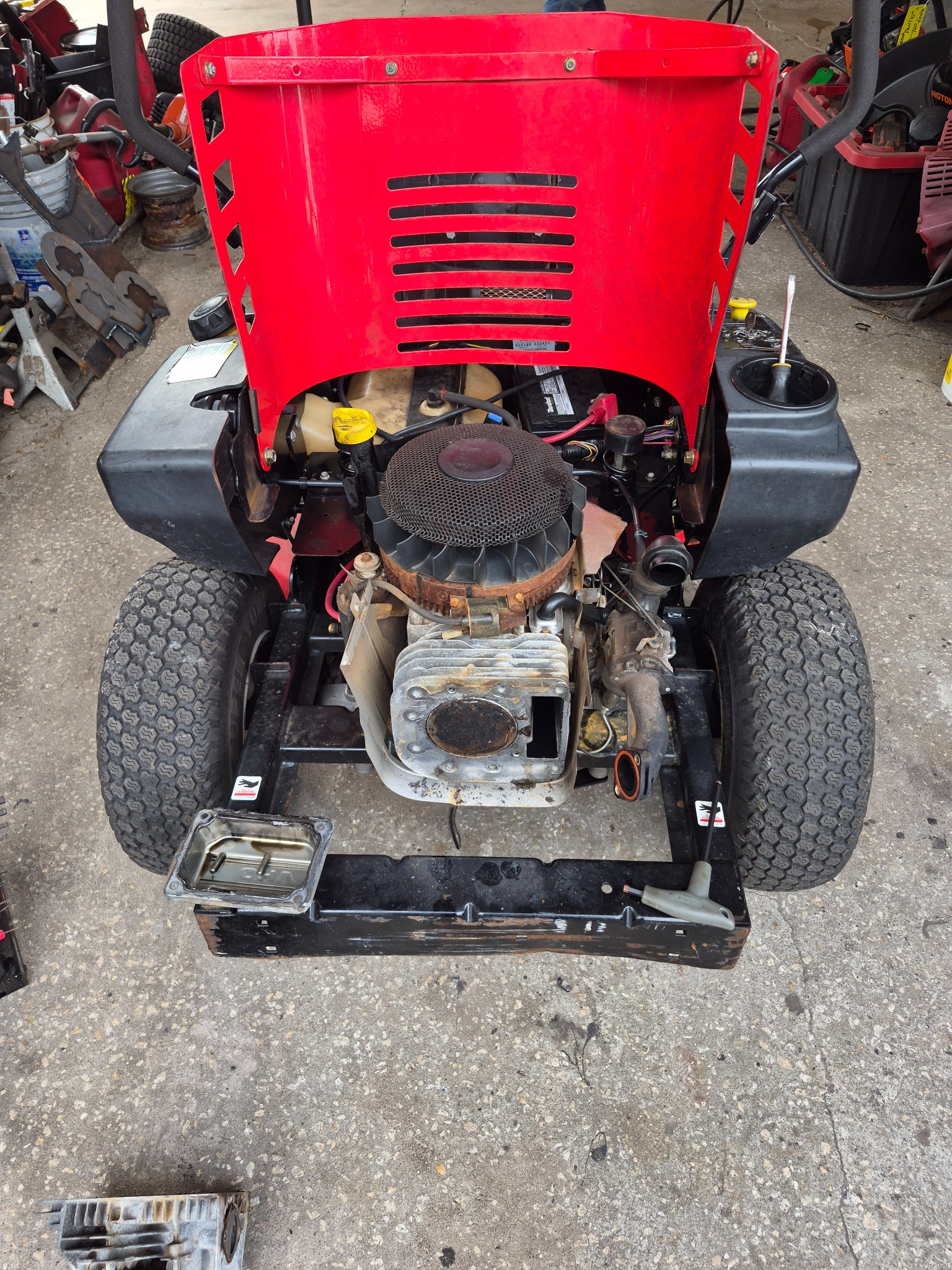Mower engine teardown in the Orange City shop